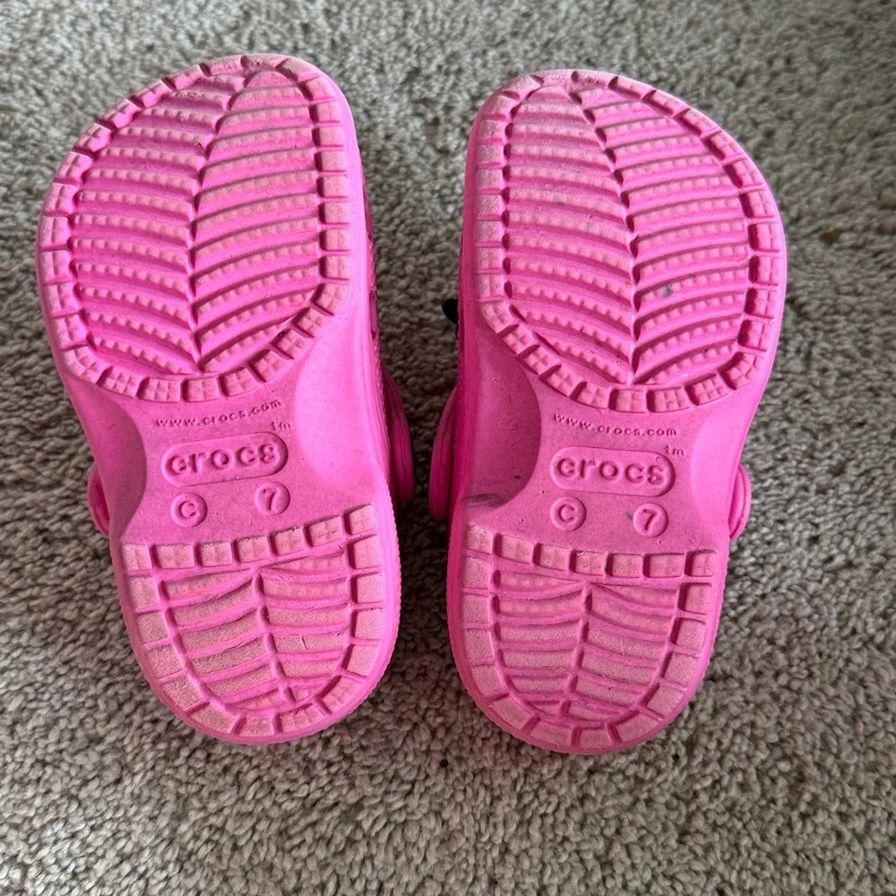 CROCS Kids Pink Clogs with Winnie the Pooh Jibbitz